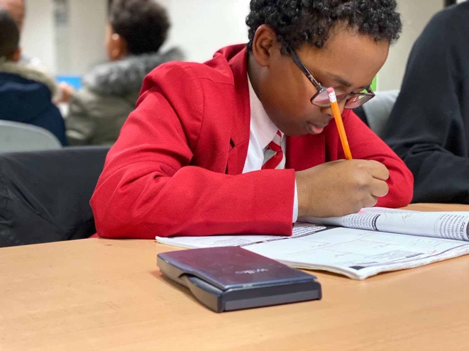 Student working through Maths practice at LEC Education